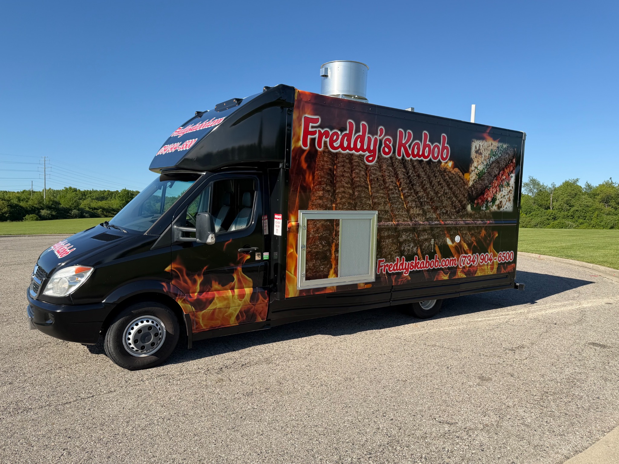 Side view of Freddy's Kabob food truck