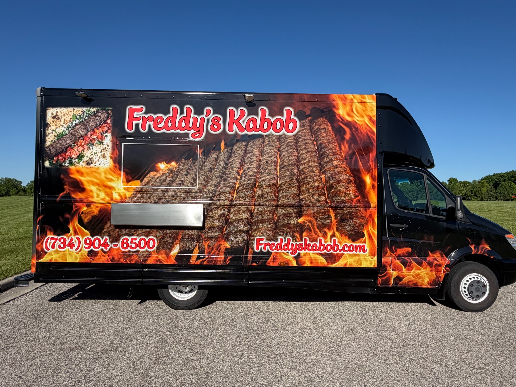 Side view of Freddy's Kabob food truck